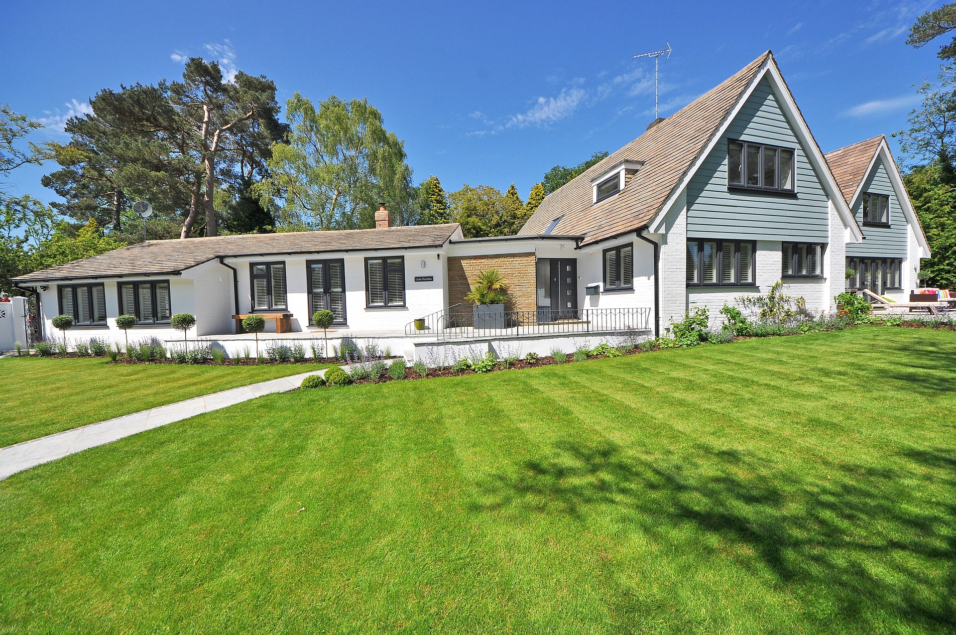 white home with green lawn